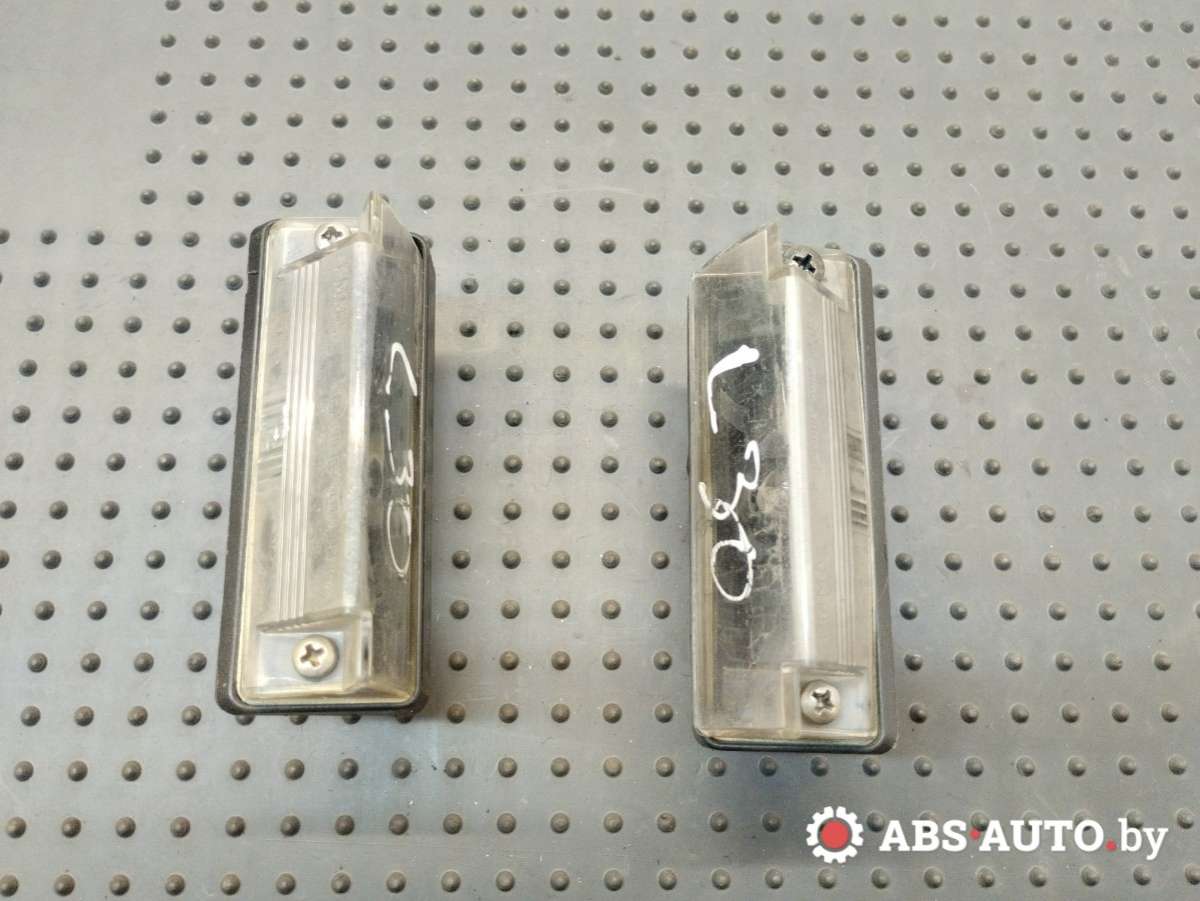 Фонарь подсветки номера Mitsubishi MR485387 для Mitsubishi Carisma (DA) 1999-200